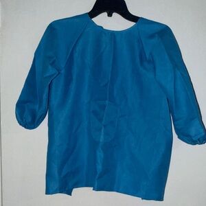 Kid’s aprons bundle of 12, size medium, various colors.